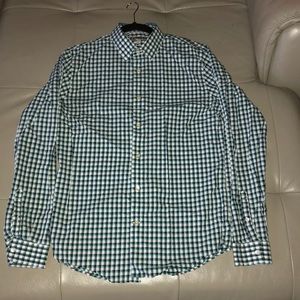 Medium sized gingham patterned button up shirt
